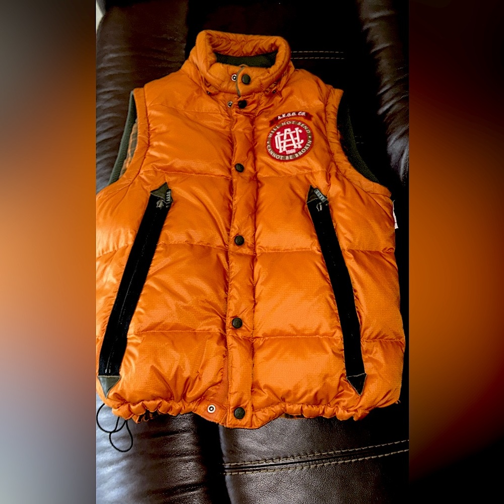 Akoo orange short sleeve vest